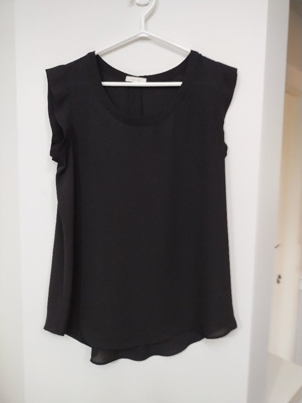 Pleione sheer sleeveless flowy top